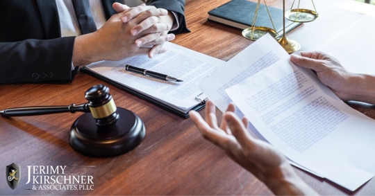 Client reviewing documents with a probate attorney